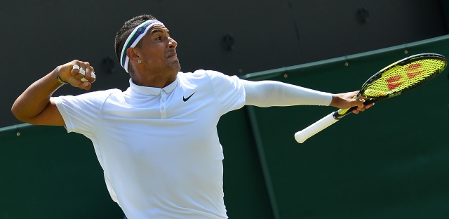 Australia's Nick Kyrgios celebrates winning the second set during his men's singles third round match against Canada's Milos Raonic on day five of the 2015 Wimbledon Championships at The All England Tennis Club in Wimbledon, southwest London, on July 3, 2015. RESTRICTED TO EDITORIAL USE -- AFP PHOTO / GLYN KIRK / AFP / GLYN KIRK